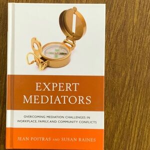Expert Mediators Book with Gold Compass